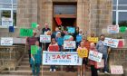Save our Surgeries Burghead and Hopeman campaign group protest ahead of a meeting of the Integration Joint Board.