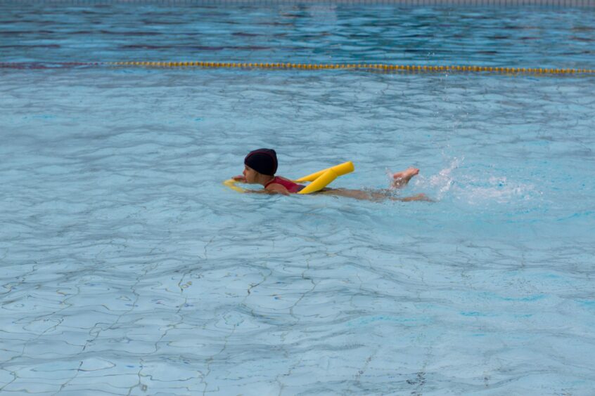 Young swimmer at Craig MacLean Leisure Centre pool.