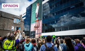 Crowds gather to admire a 2022 Nuart mural in Aberdeen city centre (Image: Wullie Marr/DC Thomson)
