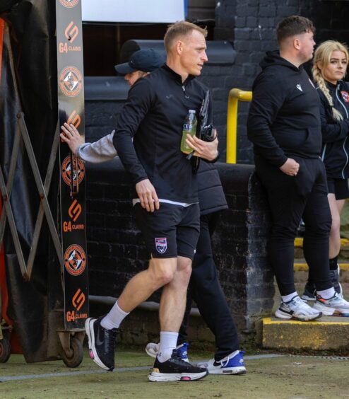 Carl Tremarco, in his role as Ross County's first team coach during a Premiership match against Dundee United.