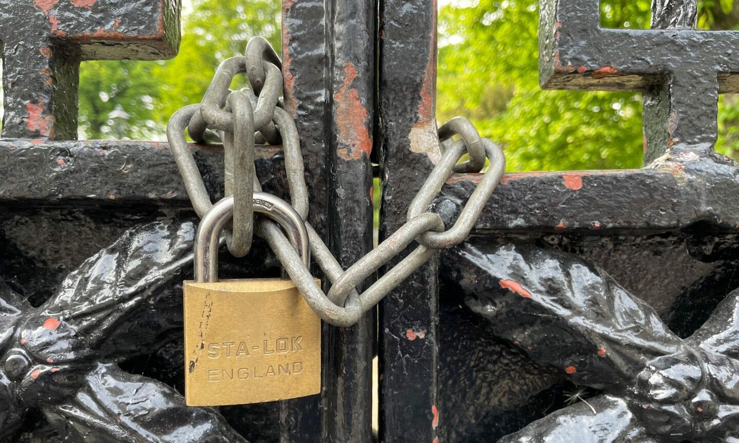 Lock on cemetery's gate.