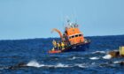 Buckie lifeboat called to help burning fishing boat in the Moray Firth.