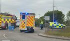 Police at the scene of a crash near Tullos roundabout in Aberdeen. Image: DC Thomson.