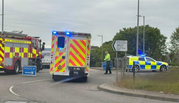 Police at the scene of a crash near Tullos roundabout in Aberdeen. Image: DC Thomson.
