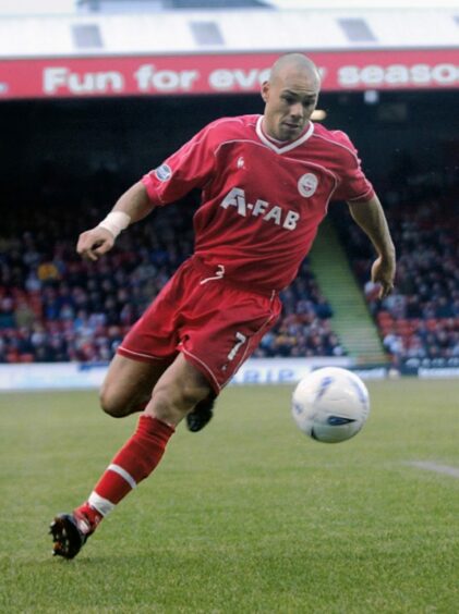 Belgian cult hero Roberto Bisconti here wearing the Dons home strip for 2002/03 and 2003/04.