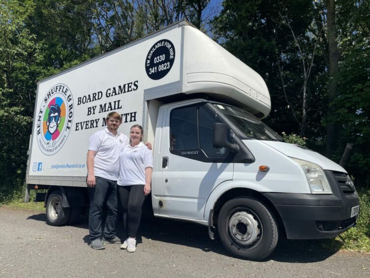 Glenn and Jen Bowen with their new van for transporting all their board games.