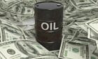 Oil barrels and dollar bills.