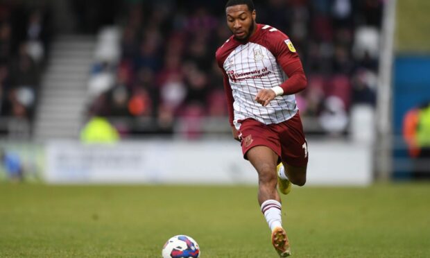 Ali Koiki in action for 
Northampton Town. Image: Shutterstock.