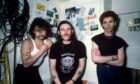Phil Taylor, Lemmy and Brian Robertson before the band hit the road for Scotland in 1983. Image: Shutterstock.