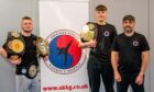 AKKG founder Danny Collins, right, with Watson Clark, centre, and Lewis Ironside, left, who won the group's first martial arts titles.