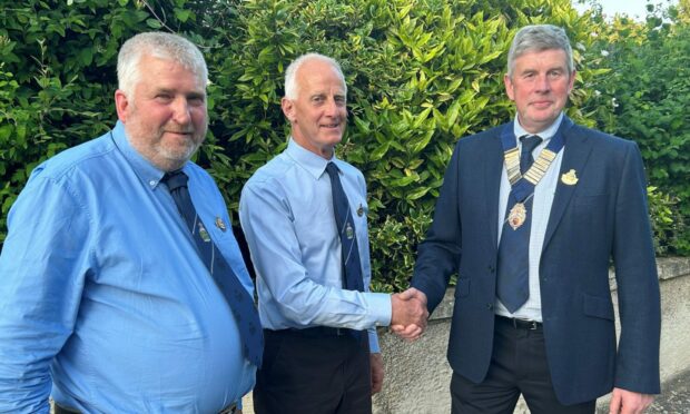 Junior vice-president Brain Ross with outgoing president Billy Stewart and new president Alan Cumming.