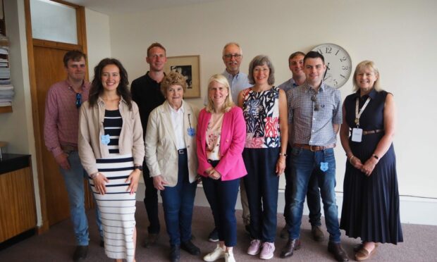 The Gregor Award Trust (GAT) and its committee took the opportunity to meet at the SAYFC centre during the Royal Highland Show. Back from left: Fraser Ross, Stuart Jamieson, Graham Pascall, Lewis Gallier, Front: Eve Newlands, Helen Milne, Gillian Robertson, Lorna Pascall, John Forbes and Karen Mutch.