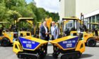 JCB Global Major Accounts MD Steve Fox (left) pictured with Jewson Business Development Director Mark Esling and the new fleet of JCB machines.