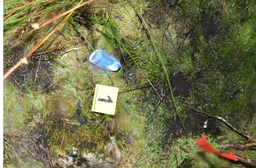 A Red Bull can placed by Alexander McKellar's girlfriend near where Tony Parsons' body was buried. 