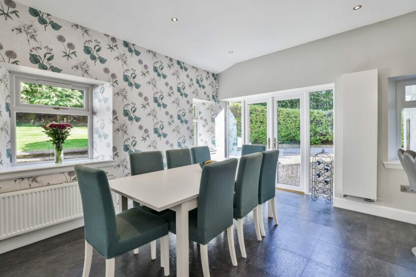 Dining area with door to the back garden with views of the Banchory countryside.