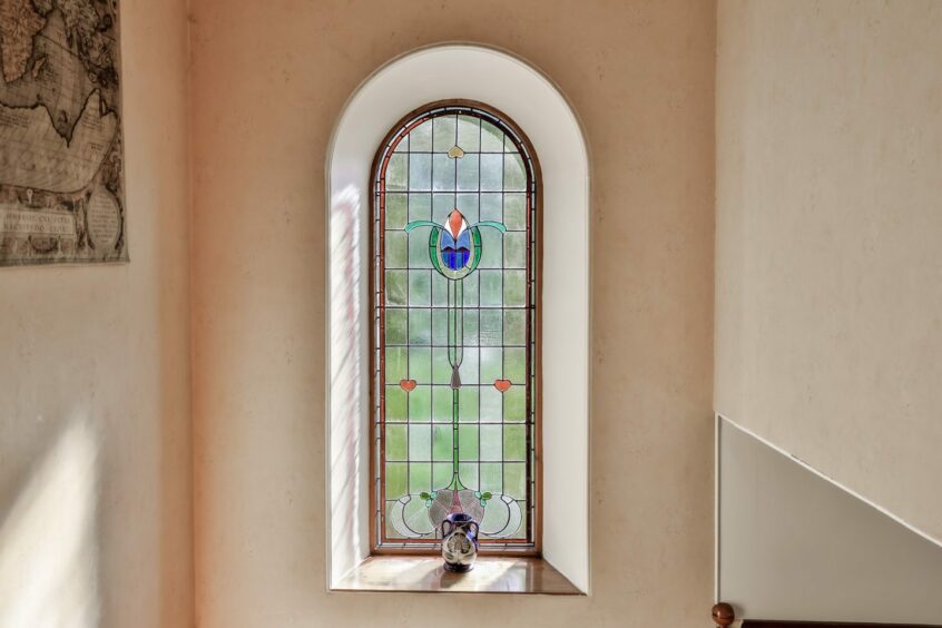 Stained glass window in the Banchory countryside home.