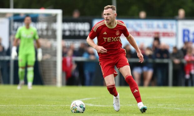 Aberdeen summer signing Nicky Devlin in action during the 9-0 friendly defeat of Turriff United. Image; Shutterstock