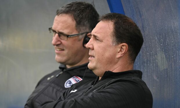 Ross County boss Malky Mackay, alongside head of recruitment Enda Barron. Image: SNS