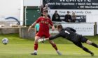 Teenage Aberdeen striker Alfie Bavidge scores to make it 1-0 in the pre-season friendly against Fraserburgh. Image: SNS