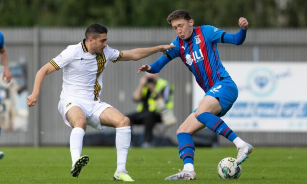 Nathan Shaw in action against Dumbarton's Carlo Pignatiello. Image: Craig Foy/SNS Group