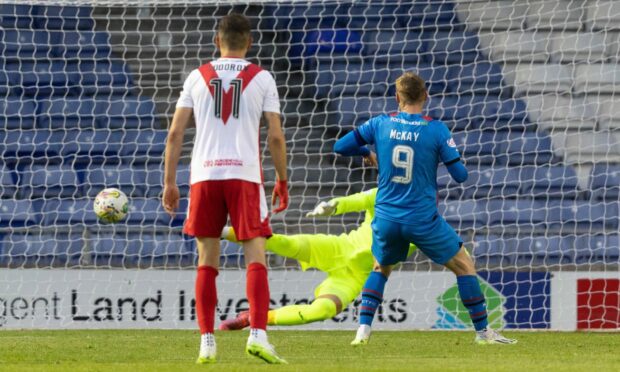 Billy Mckay tucks away his penalty against Airdrie, for his 102nd goal for ICT. Image: Ross Parker/SNS Group