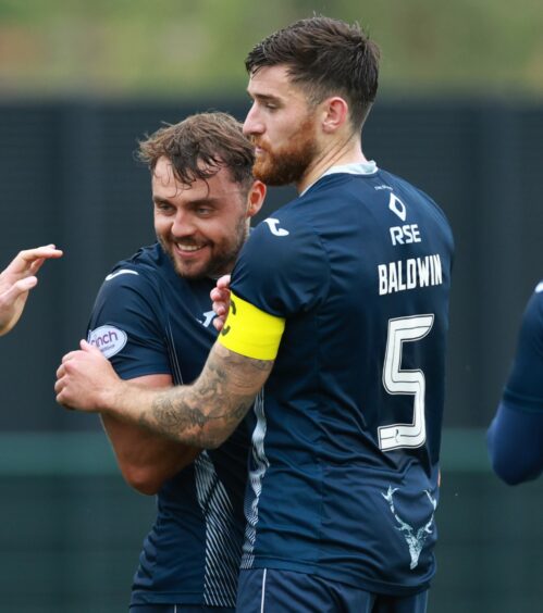 Ross County's Connor Randall and Jack Baldwin.