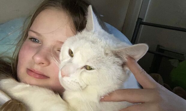 Kayla McPherson and her cat Loki
