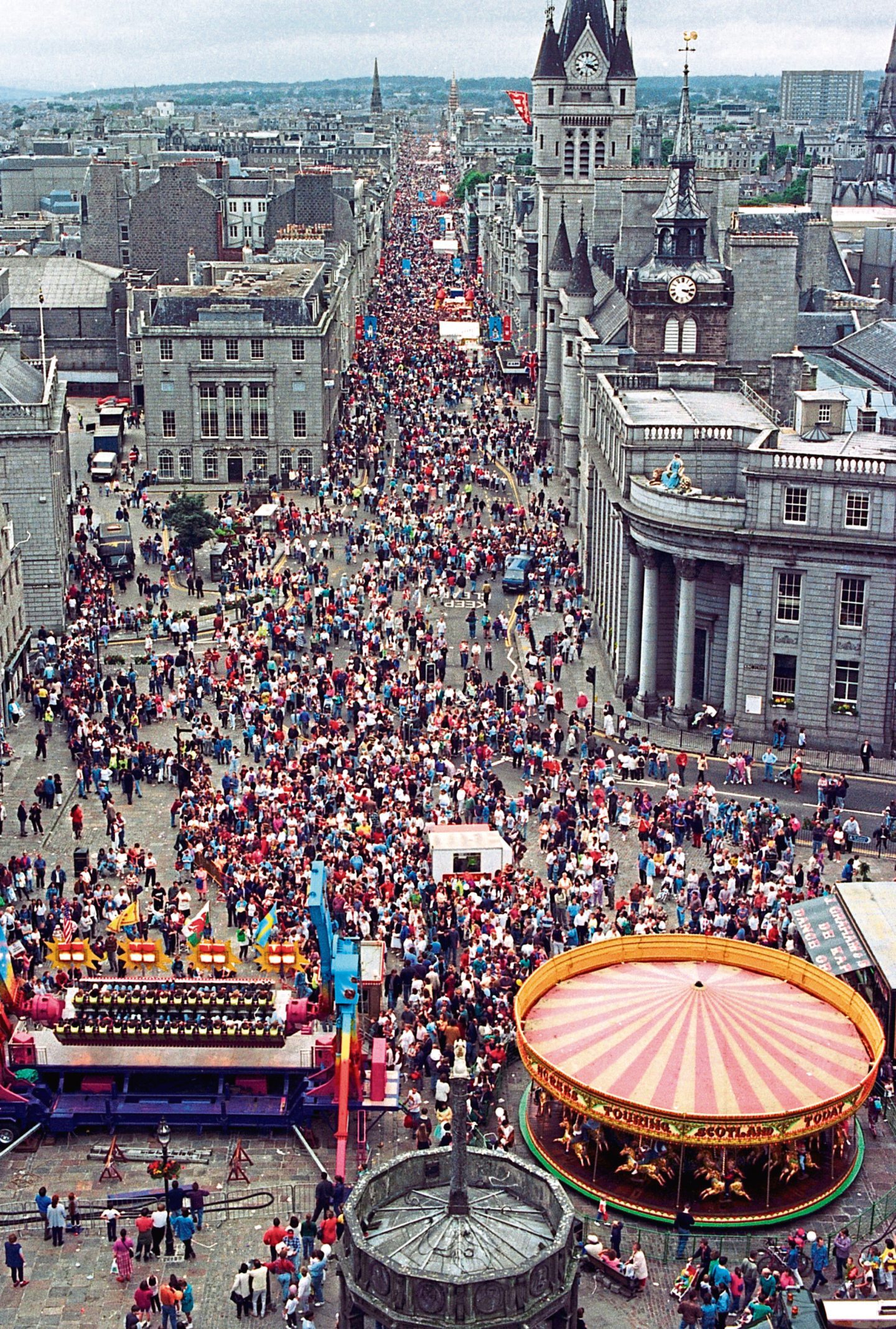 A crowd gather at the carnival set up on Union Street in Aberdeen in July 1994.