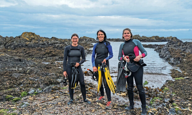 Geared up and ready to snorkel in Macduff: Lauren Smith, Gayle Ritchie and Marie Dare.