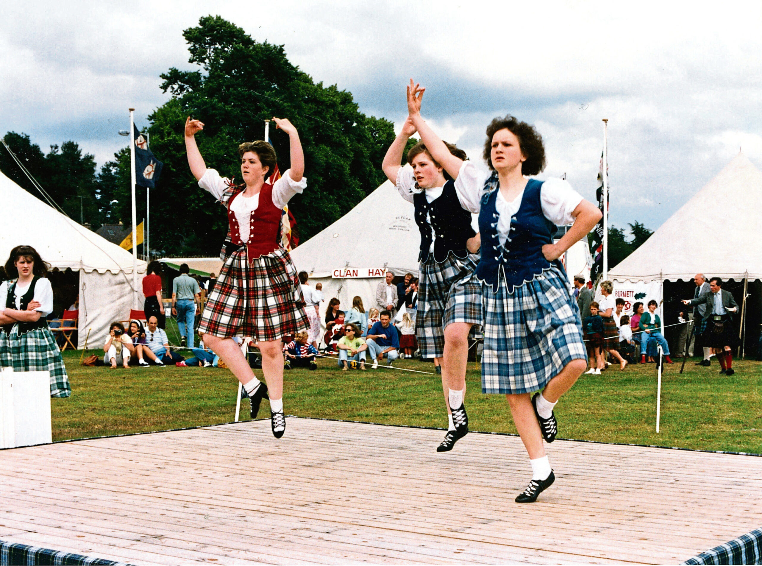 Three young women - Faye Henderson, Anna Thomson and Karen Ogg - competing in the Highland Fling in Aboyne Games 1991.
