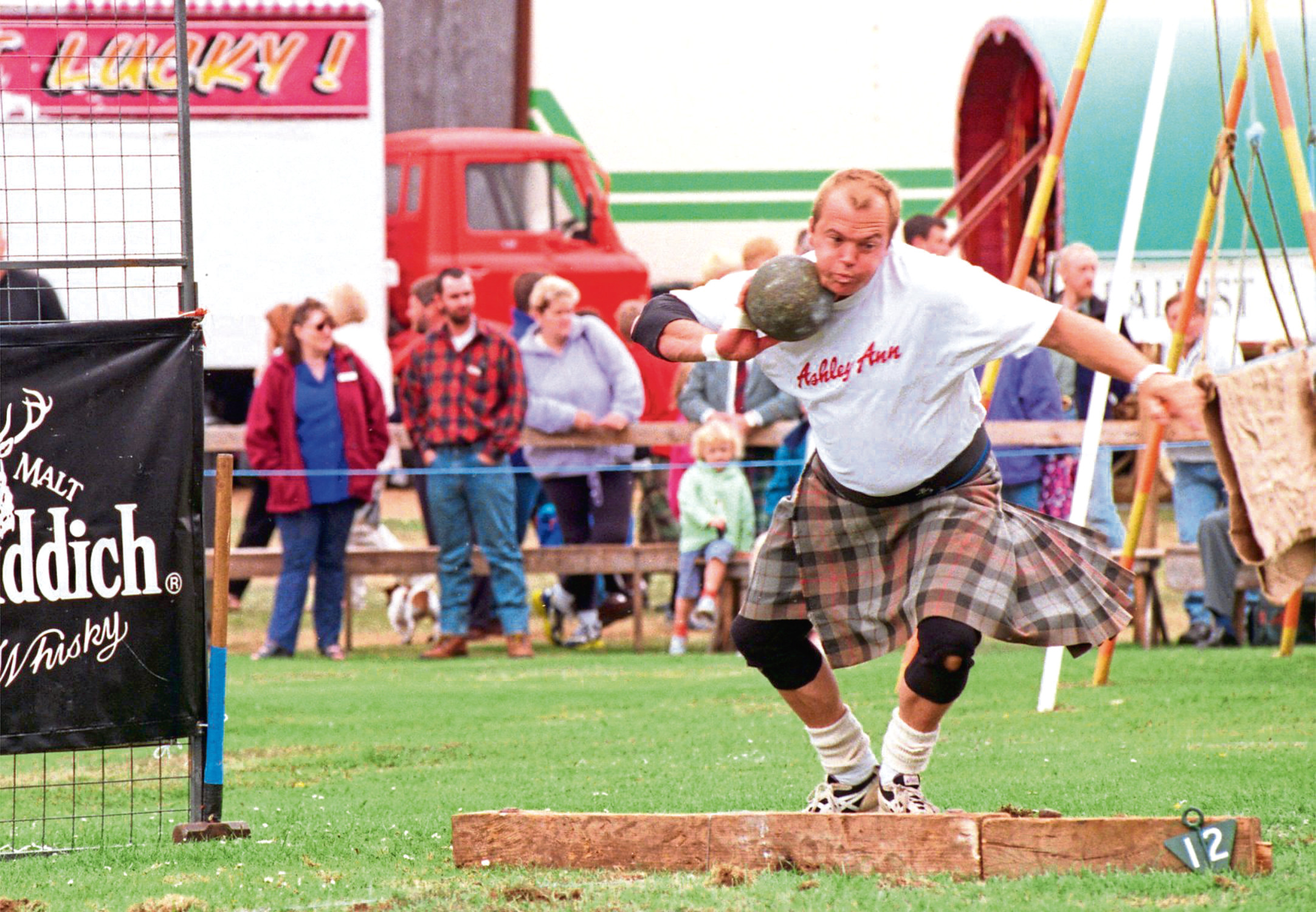 Alistair Gunn getting to grips with the heavy stone during the 1999 games.