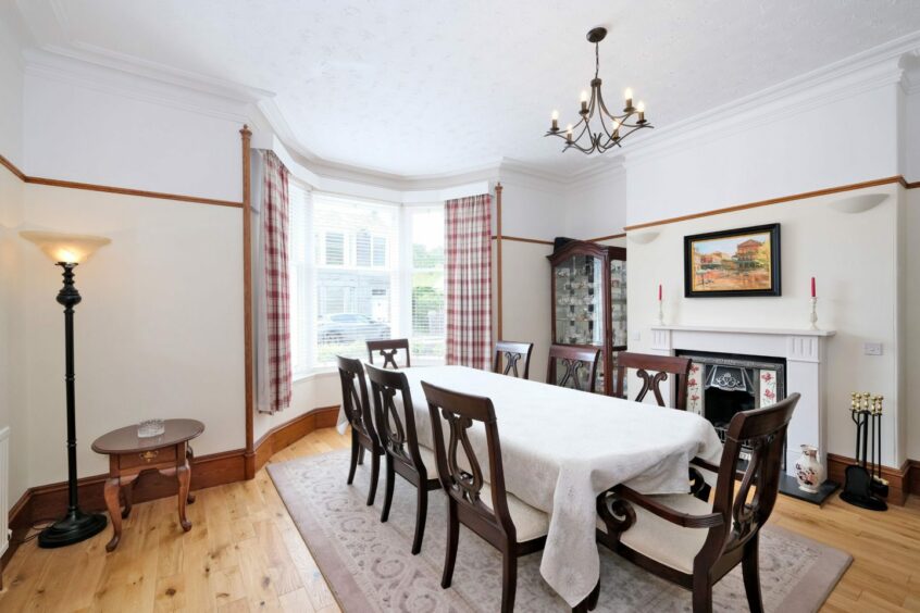 Large dining room with plenty of natural light inside the home in Cults, Aberdeen.