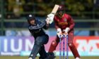 Brandon McMullen impressed with the bat and ball for Scotland against the West Indies. Image ICC