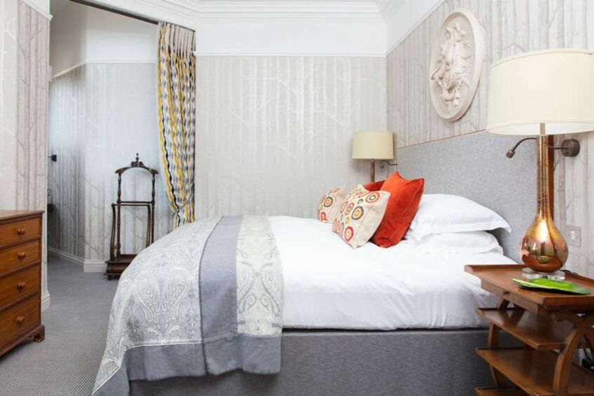 The bedroom in the luxurious JK Rowling suite at The Balmoral in Edinburgh features a mattress from Glencraft in Aberdeen