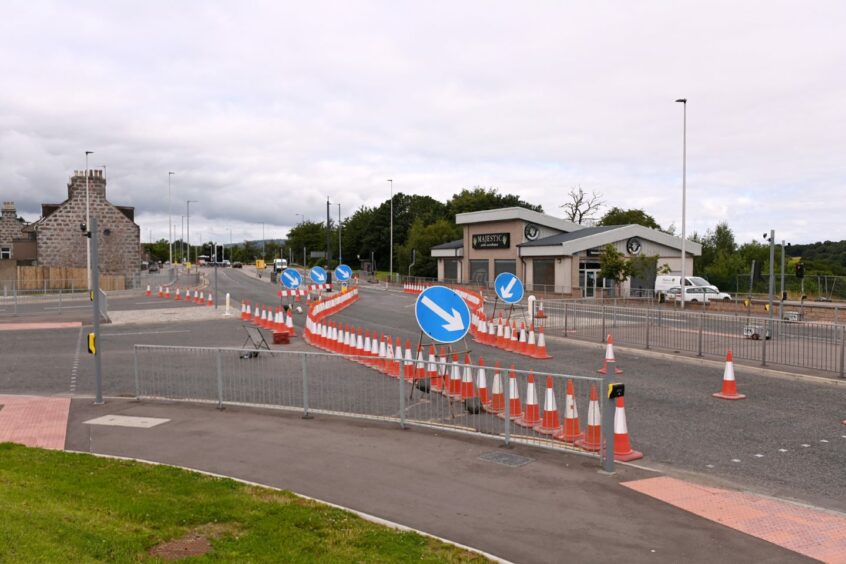 Contraflow system set up on the Aberdeen road with traffic cones and signs.