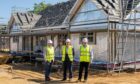Work is underway at the new Rothney West development in Insch. Pictured from left are Stephen Westall, sales and marketing executive; Allan Brown, managing director and Martyn Skinner, project architect at Drumrossie Homes. Image: Engage PR
