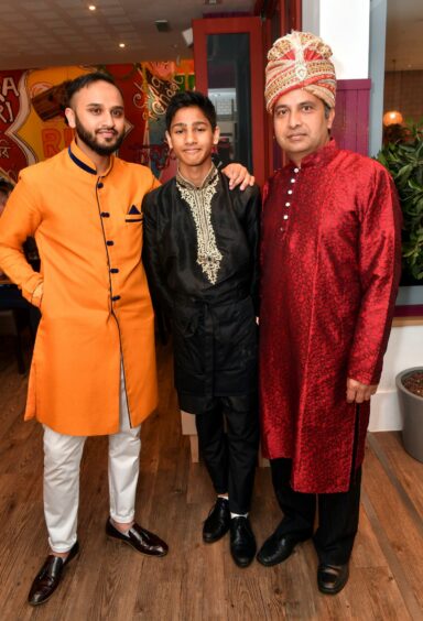 Anis Ahmed, Saif Naseem and Prasad M standing in a row