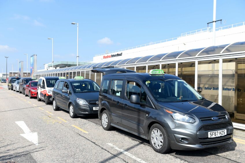 Taxis outside Aberdeen Airport.