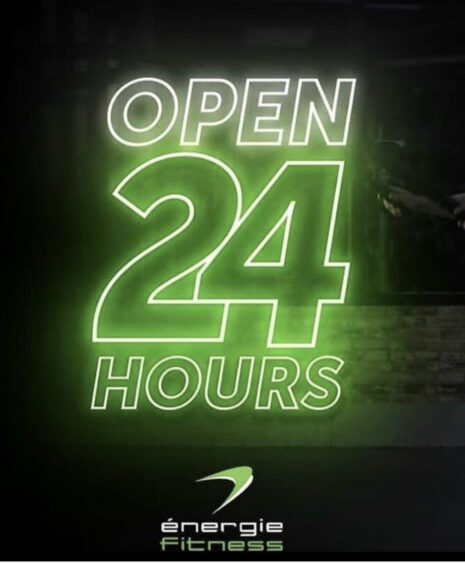 graphic advertising Energie Fitness reads 'Open 24 hours'