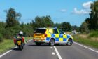Police at the crash on the A96.