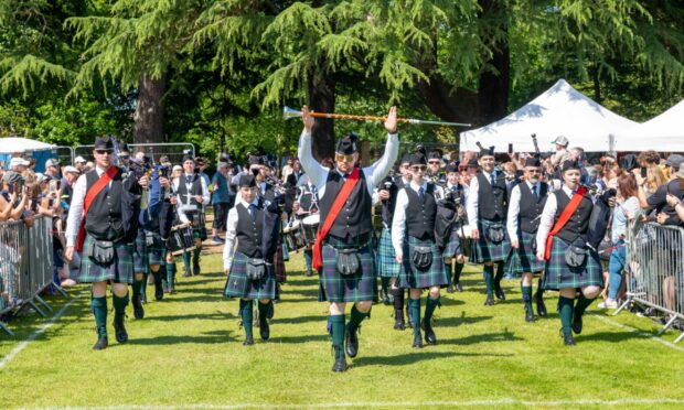 Forres Pipe Band enter the arena. Image: Jasperimage.