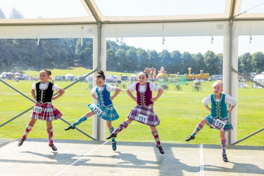 Annaleesa Smith, Faye Wisninicki, Orla Mackie and Ebony Milne taking part in Highland dancing at the Games. 
