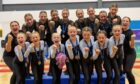 Fyrish Gymnastics Club celebrate winning two gold medals at the Scottish TeamGym Championships at Ravenscraig in June. Image: Scottish Gymnastics