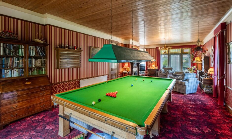 Pool table inside the home.