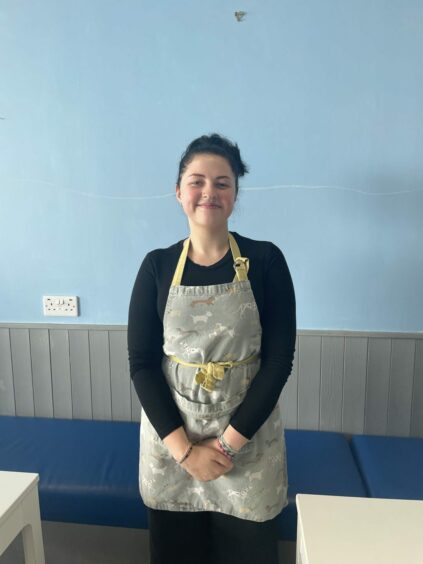 Young woman who works at Barking Mad cafe.