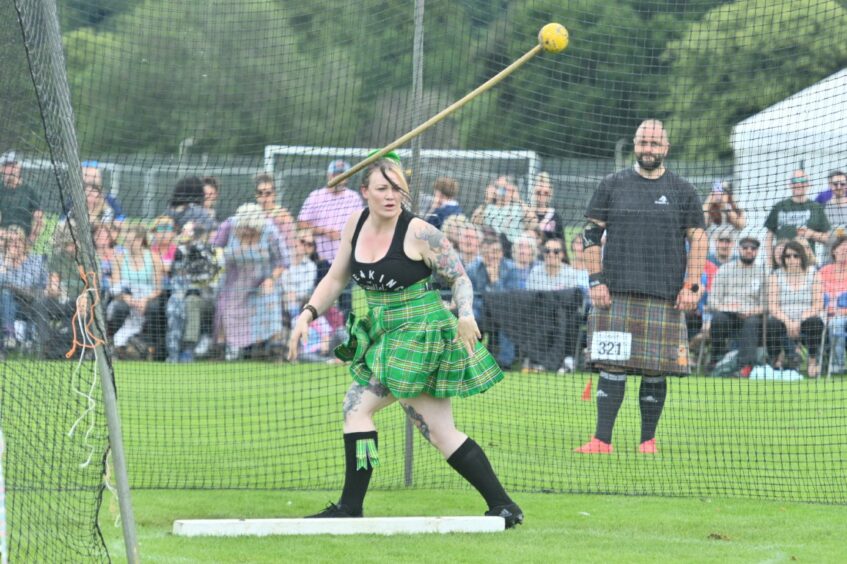 Edwina Madden Egan competing in the hammer throw.