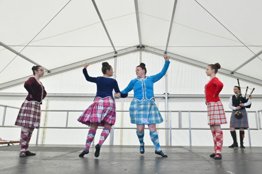 Novice Highland dancers competition.
