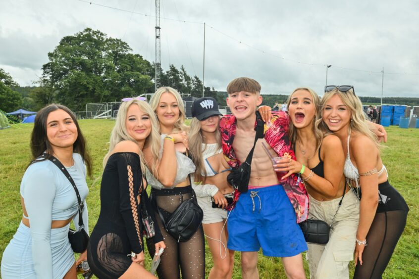Group of friends pose for pictures on Thursday at Belladrum 2023.