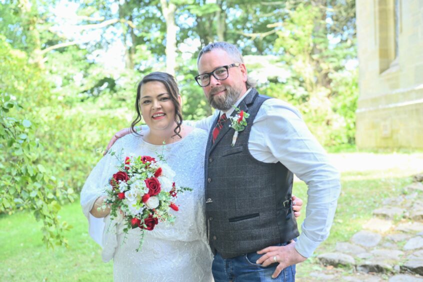 Sarah and Dennis Weaver on their wedding day at Belladrum Festival.