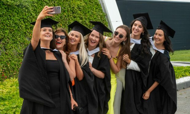 Graduates take a group selfie. Image: Kenny Elrick/DC Thomson